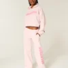 Pantaloni de trening cu picior larg și logo Pantaloni de trening cu picior larg și logo