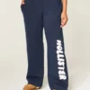 Pantaloni de trening cu picior larg și logo grafic