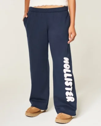 Pantaloni de trening cu picior larg și logo grafic