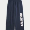 Pantaloni de trening cu picior larg și logo grafic