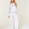 Pantaloni de trening cu picior larg și logo strălucitor Pantaloni de trening cu picior larg și logo strălucitor