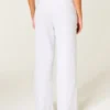 Pantaloni de trening cu picior larg și logo strălucitor Pantaloni de trening cu picior larg și logo strălucitor