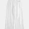 Pantaloni de trening cu picior larg și logo strălucitor Pantaloni de trening cu picior larg și logo strălucitor