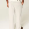 Pantaloni de trening largi cu broderie pe spate Pantaloni de trening largi cu broderie pe spate