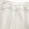 Pantaloni de trening largi cu broderie pe spate Pantaloni de trening largi cu broderie pe spate