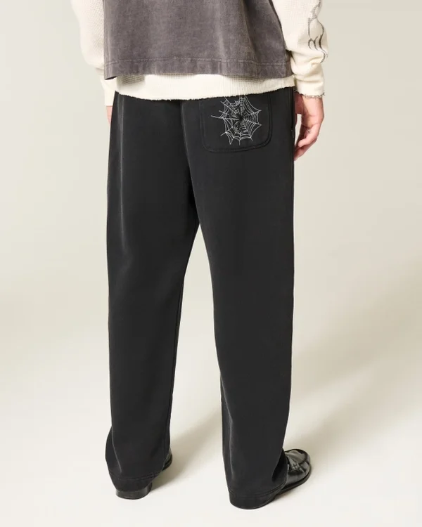 Pantaloni de trening largi cu broderie Spider Pantaloni de trening largi cu broderie Spider