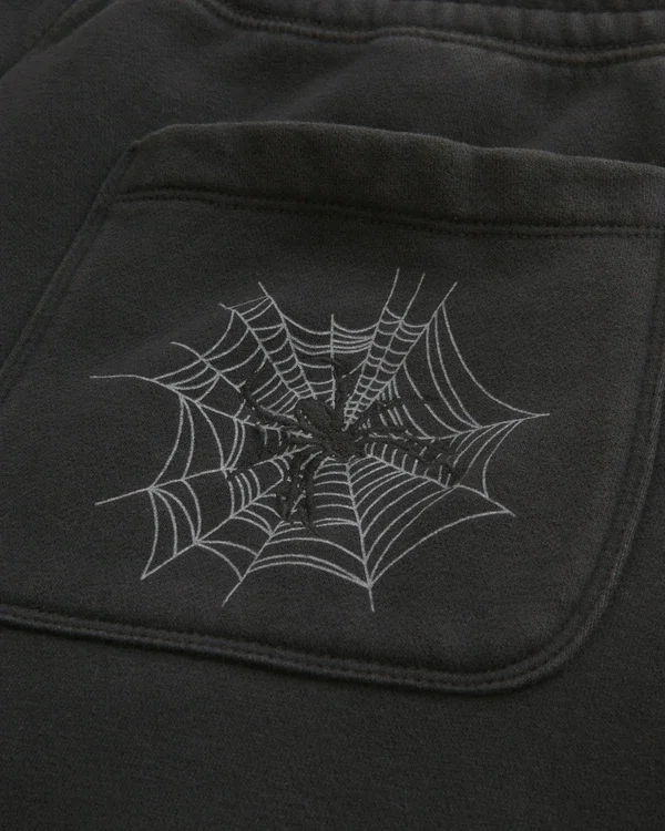 Pantaloni de trening largi cu broderie Spider Pantaloni de trening largi cu broderie Spider