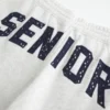 Pantaloni de trening largi cu grafică Senior Pantaloni de trening largi cu grafică Senior