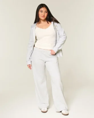 Pantaloni de trening largi cu imprimeu arc Pantaloni de trening largi cu imprimeu arc