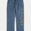 Pantaloni de trening largi cu imprimeu California din colecția Holiday Vault Pantaloni de trening largi cu imprimeu California din colecția Holiday Vault
