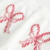 Pantaloni de trening largi cu imprimeu Candy Cane Pantaloni de trening largi cu imprimeu Candy Cane