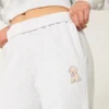 Pantaloni de trening largi cu imprimeu cu câini