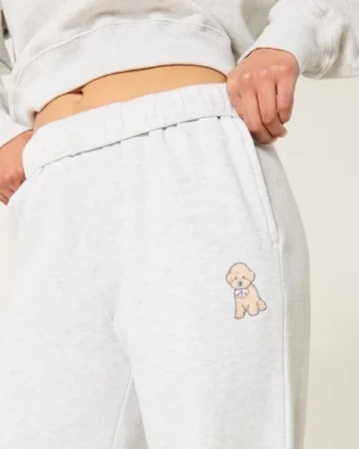 Pantaloni de trening largi cu imprimeu cu câini