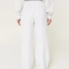 Pantaloni de trening largi cu imprimeu cu câini