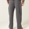 Pantaloni de trening largi cu imprimeu cu stele Pantaloni de trening largi cu imprimeu cu stele
