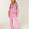 Pantaloni de trening largi cu imprimeu cu trandafiri strălucitori Pantaloni de trening largi cu imprimeu cu trandafiri strălucitori