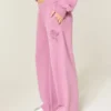 Pantaloni de trening largi cu imprimeu cu trandafiri strălucitori Pantaloni de trening largi cu imprimeu cu trandafiri strălucitori