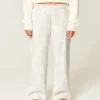 Pantaloni de trening largi cu imprimeu Doe Pantaloni de trening largi cu imprimeu Doe