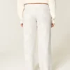 Pantaloni de trening largi cu imprimeu Doe Pantaloni de trening largi cu imprimeu Doe
