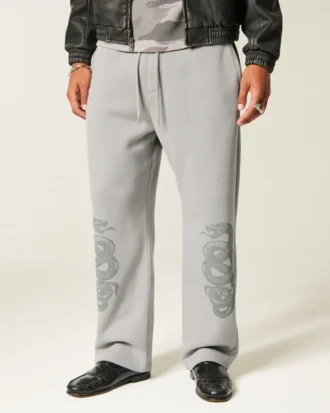 Pantaloni de trening largi cu imprimeu dublu cu șerpi