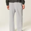 Pantaloni de trening largi cu imprimeu dublu cu șerpi Pantaloni de trening largi cu imprimeu dublu cu șerpi