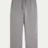 Pantaloni de trening largi cu imprimeu grafic Pantaloni de trening largi cu imprimeu grafic