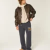 Pantaloni de trening largi cu imprimeu grafic Trojans de la University of Southern California Pantaloni de trening largi cu imprimeu grafic Trojans de la University of Southern California