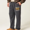 Pantaloni de trening largi cu imprimeu grafic Trojans de la University of Southern California Pantaloni de trening largi cu imprimeu grafic Trojans de la University of Southern California
