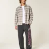 Pantaloni de trening largi cu imprimeu Ohio State University Buckeyes Pantaloni de trening largi cu imprimeu Ohio State University Buckeyes