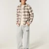 Pantaloni de trening largi cu logo Holiday Vault Release Pantaloni de trening largi cu logo Holiday Vault Release