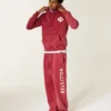 Pantaloni de trening largi cu logo Holiday Vault Release Pantaloni de trening largi cu logo Holiday Vault Release