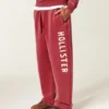 Pantaloni de trening largi cu logo Holiday Vault Release Pantaloni de trening largi cu logo Holiday Vault Release
