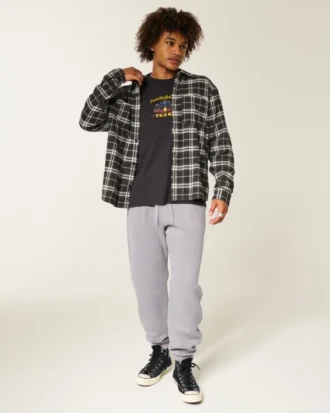 Pantaloni de trening largi cu tiv strâns Pantaloni de trening largi cu tiv strâns