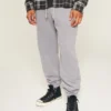 Pantaloni de trening largi cu tiv strâns Pantaloni de trening largi cu tiv strâns