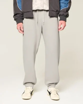 Pantaloni de trening largi cu tiv strâns