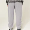 Pantaloni de trening largi cu tiv strâns Pantaloni de trening largi cu tiv strâns