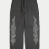 Pantaloni de trening super largi cu imprimeu Double Flame Pantaloni de trening super largi cu imprimeu Double Flame