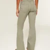 Pantaloni evazați cu talie brodată ultra joasă Pantaloni evazați cu talie brodată ultra joasă