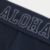 Pantaloni evazați cu talie pliată și imprimeu Aloha Pantaloni evazați cu talie pliată și imprimeu Aloha
