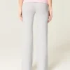 Pantaloni evazați din tricot cu talie pliată Pantaloni evazați din tricot cu talie pliată