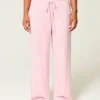 Pantaloni largi, cu talie joasă, care se îmbracă ușor Pantaloni largi, cu talie joasă, care se îmbracă ușor
