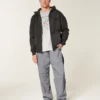 Pantaloni largi de trening Pantaloni largi de trening
