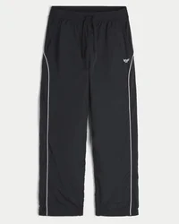 Pantaloni largi de trening