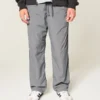 Pantaloni largi de trening Pantaloni largi de trening