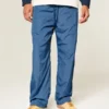Pantaloni largi de trening Pantaloni largi de trening