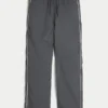 Pantaloni largi de trening Pantaloni largi de trening