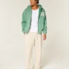 Pantaloni largi de trening cu imprimeu New York Pantaloni largi de trening cu imprimeu New York