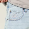 Pantaloni scurți baggy din denim cu imprimeu grafic cu stele Pantaloni scurți baggy din denim cu imprimeu grafic cu stele
