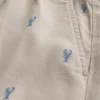 Pantaloni scurți cu model de homar până la jumătatea coapsei