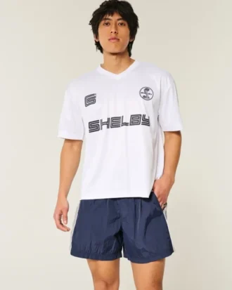 Pantaloni scurți de fotbal largi, până la jumătatea coapsei Pantaloni scurți de fotbal largi, până la jumătatea coapsei